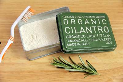 image: DIY eco toothpaste organic cilantro tin with toothbrush