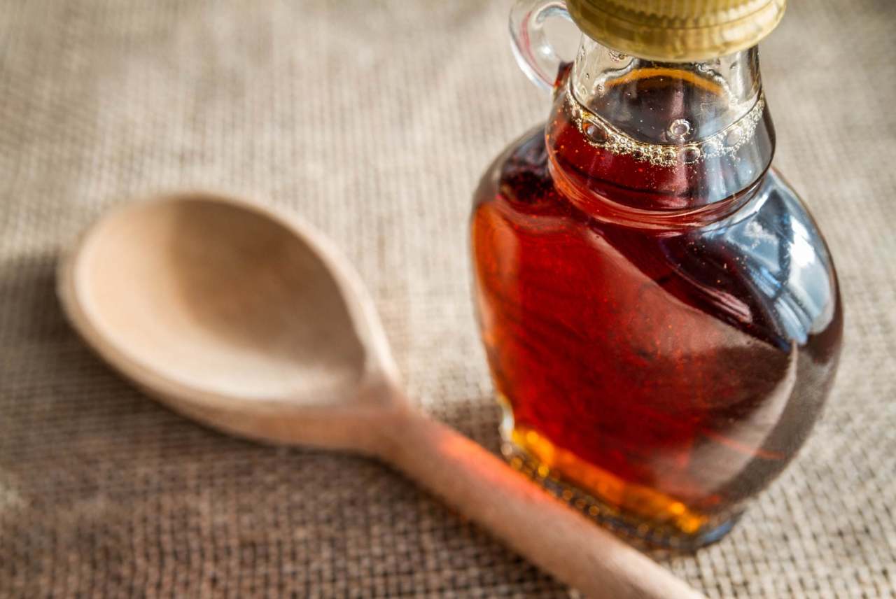 maple-syrup-glass-jar-wooden-spoon-cooking-honey-alternative