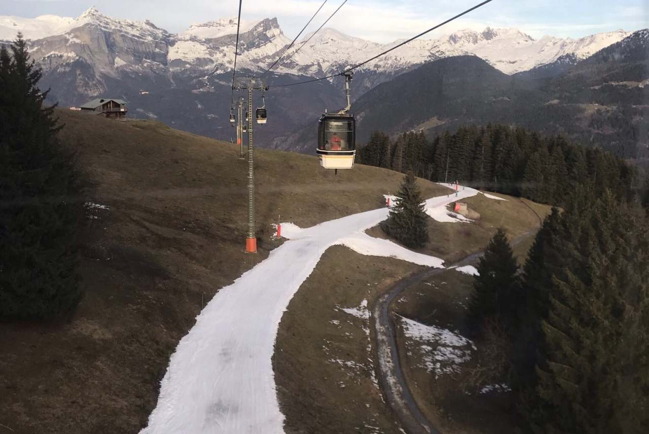 Ski resort with very little snow in small path