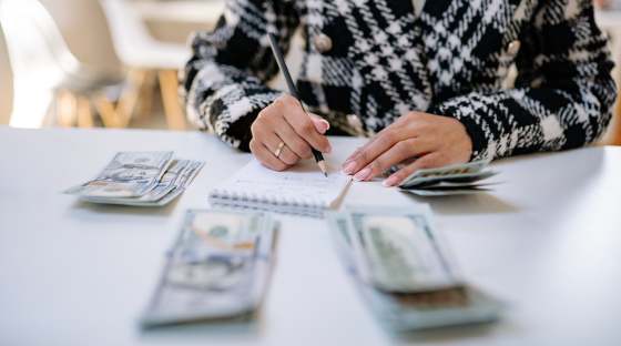Person counting money
