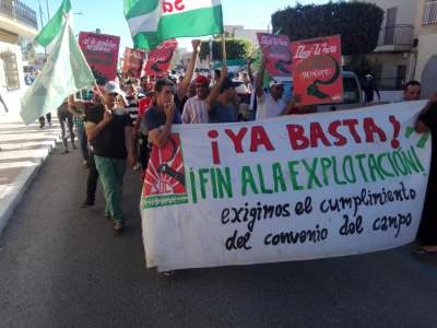 Image: protest banner workers rights almeria spain