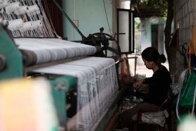 Woman weaving in Vietnam