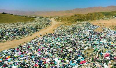 Piles of clothes in desert