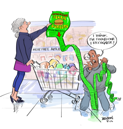 Cartoon: woman in supermarketing holding packet of vegan burgers with long list of ingredients. Man says "I think I've found one I recognise!" holding the end of the long list.