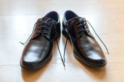 Pair of smart black shoes for wearing with suit 