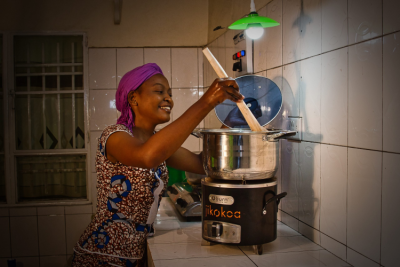 Woman cooking on stove top