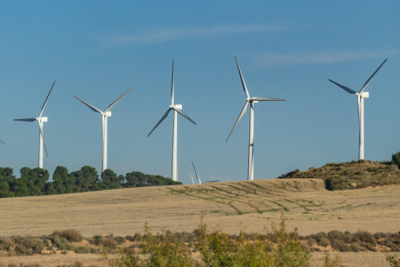 Five wind turbines on land