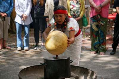 Person making cocoa ceremony ritual 