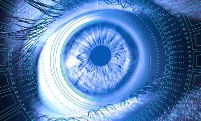 Image of eyeball surrounded by computer code