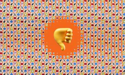 Yellow 'thumbs down' icon on top of hundreds of icons of social media platforms