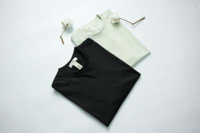 Two t-shirts folded, one black one white