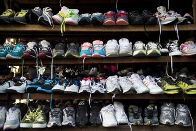 shelves of used secondhand trainers