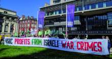 image: protesters with banner reading hsbc profits from israeli war crimes which led to hsbc divesting from israeli war crimes