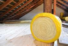 Roll of loft insulation in loft