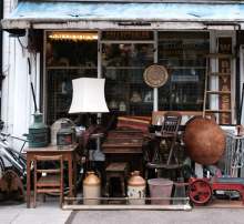 Secondhand furniture for sale outside an antiques shop