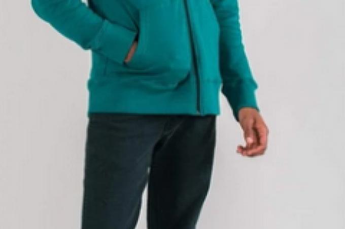 Man wearing green hoodie and black jeans 