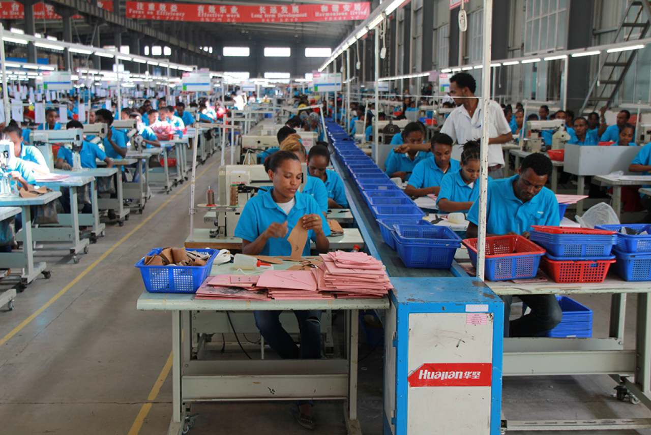 Image: ethiopian garment workers making shoes in chinese factory
