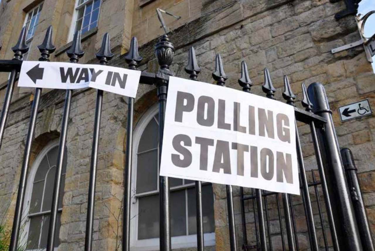 image: polling station way in tax manifesto