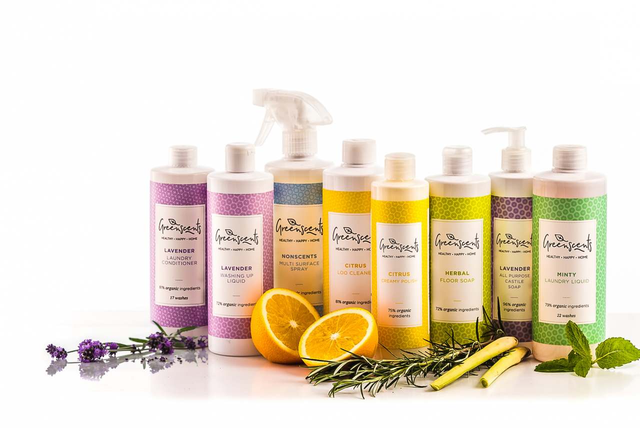 image: greenscents eco friendly cleaning products lined up organic ingredients oranges lavender