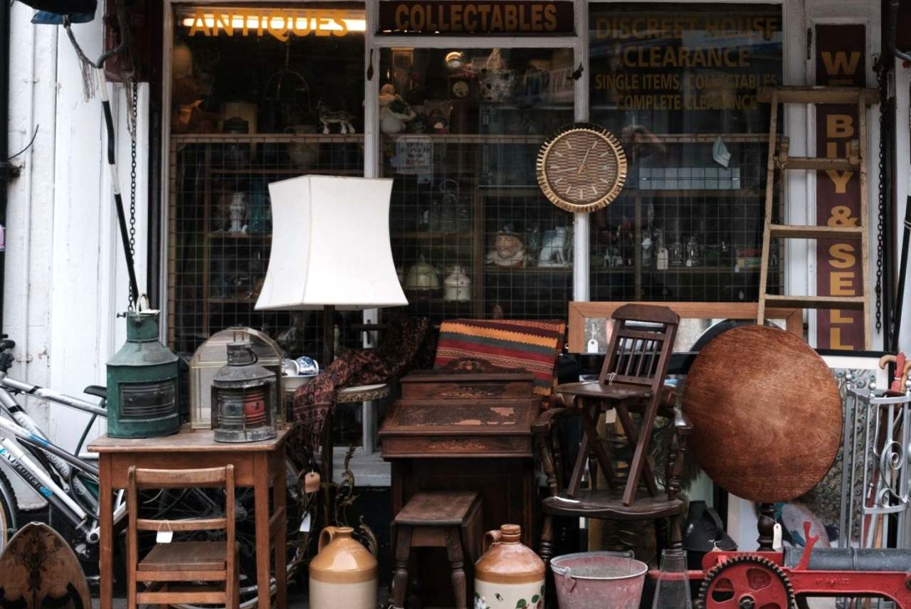 Secondhand furniture for sale outside an antiques shop