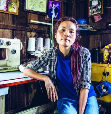 image: female garment worker no living wages