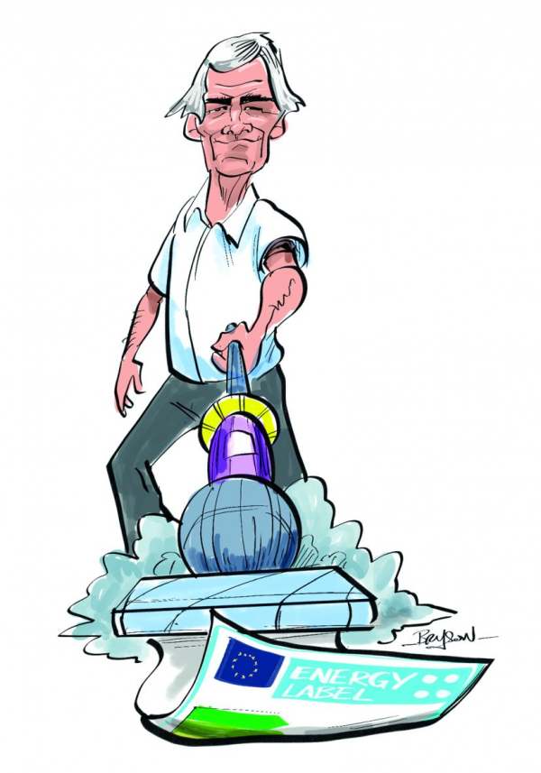 Cartoon of James Dyson sweeping up energy label with vacuum cleaner