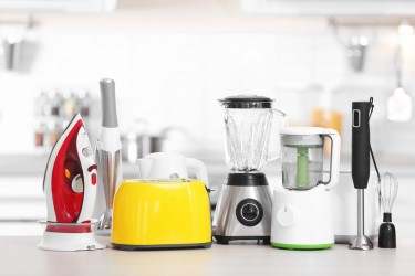 Five kitchen appliances on worktop