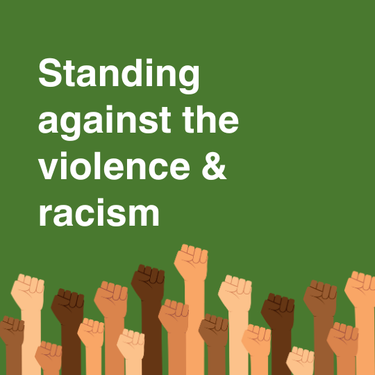 Standing against violence and racism. Illustration of raised fists.